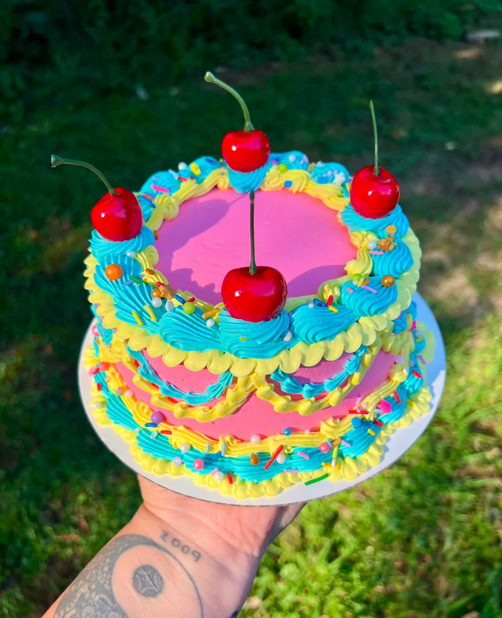 Colorful cherry-topped cake