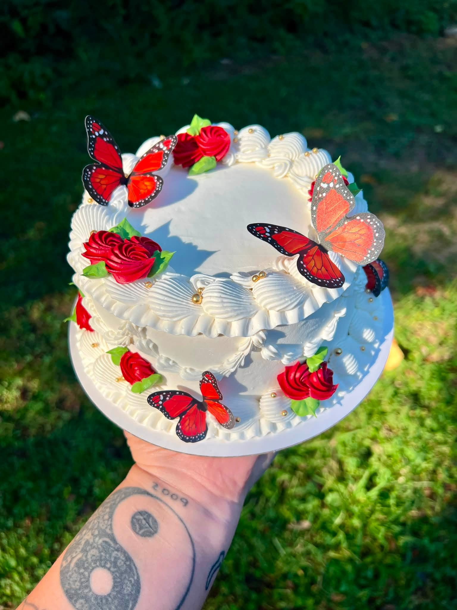 Butterfly and red rose cake